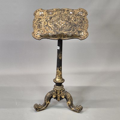 Lot 1673 - A 19th century gilt black lacquer adjustable...