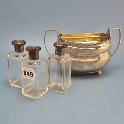 Lot 849 - A set of three dressing table bottles with...