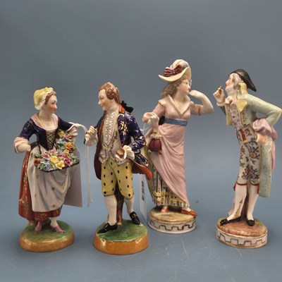Lot 854 - A Dresden figure of a gallant and his lady. ...