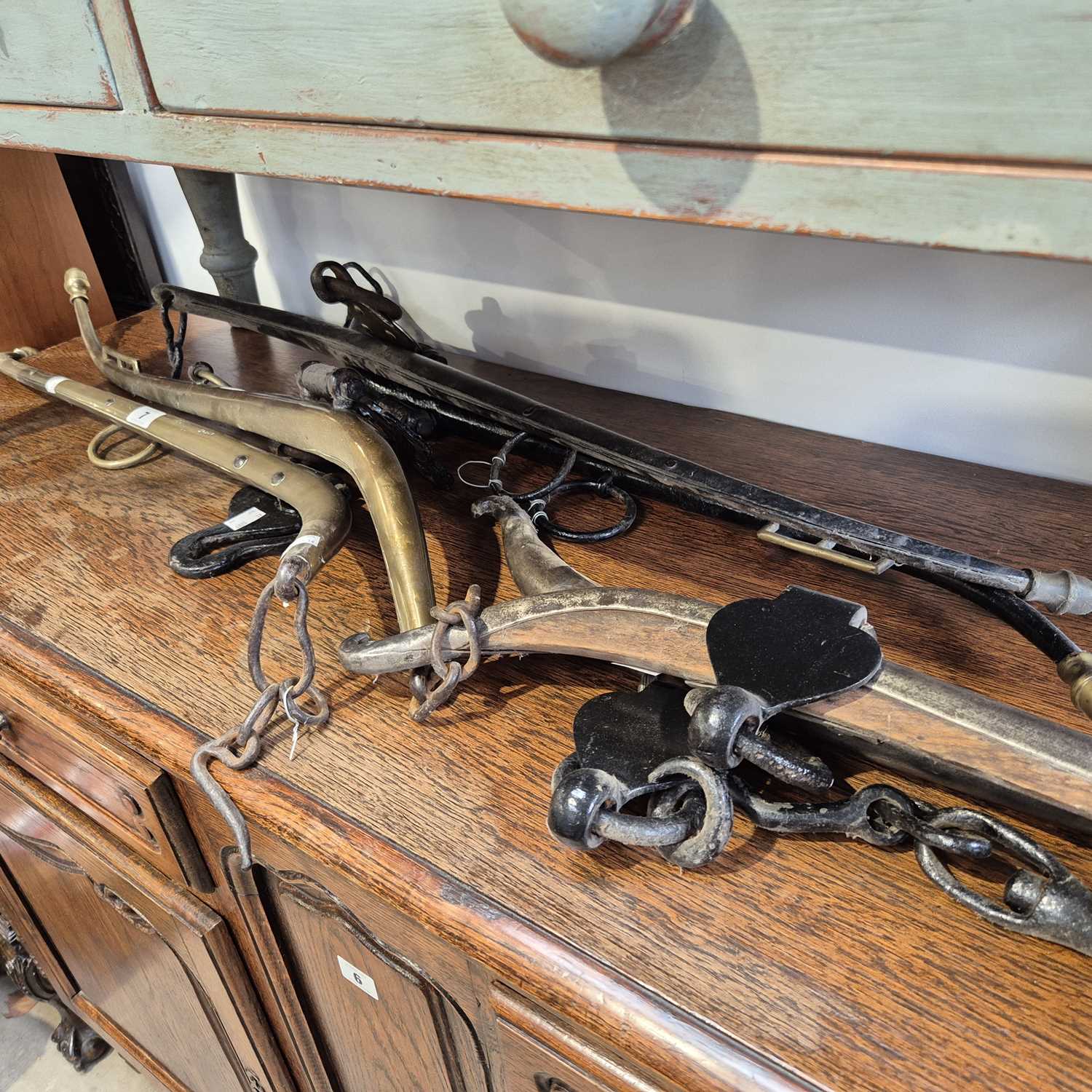 Lot 7 - Three sets of horse hames.