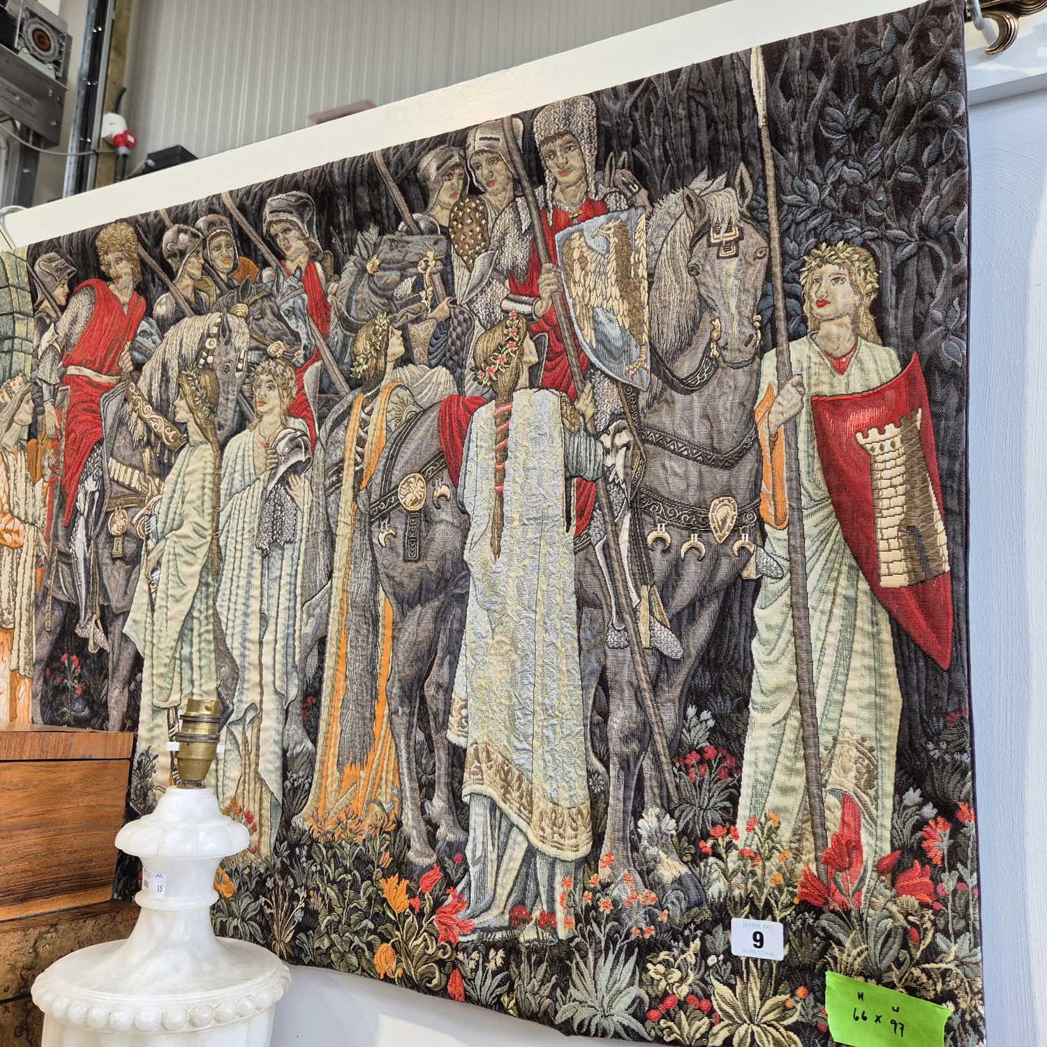 Lot 9 - A tapestry type banner 97 x 66 cm.