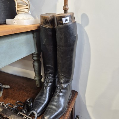 Lot 10 - A pair of black leather riding boots.