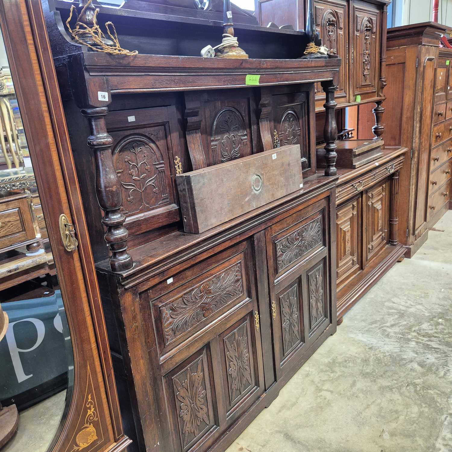 Lot 16 - An antique and later oak court cupboard with...