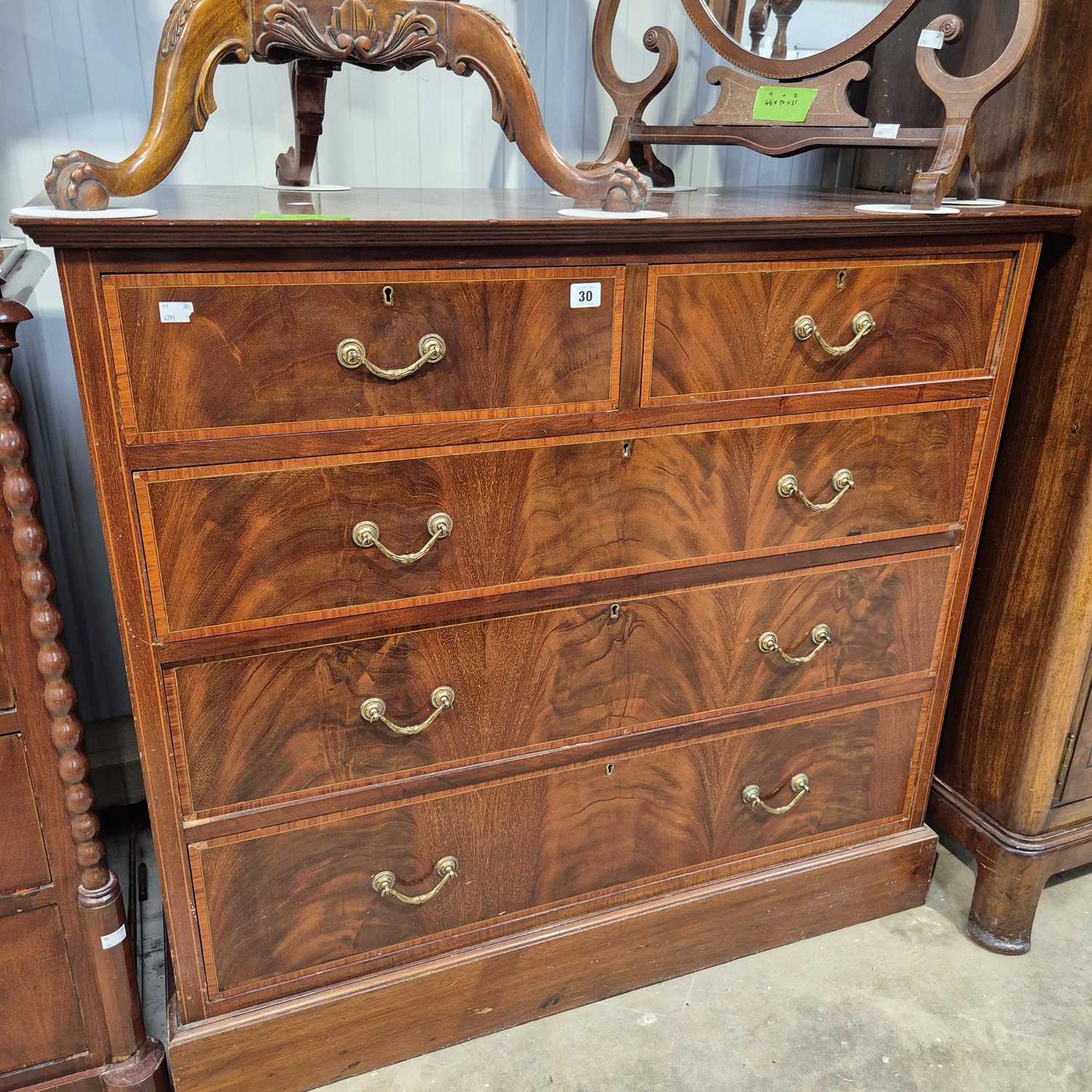 Lot 30 - An Edwardian mahogany and inlaid chest of five...
