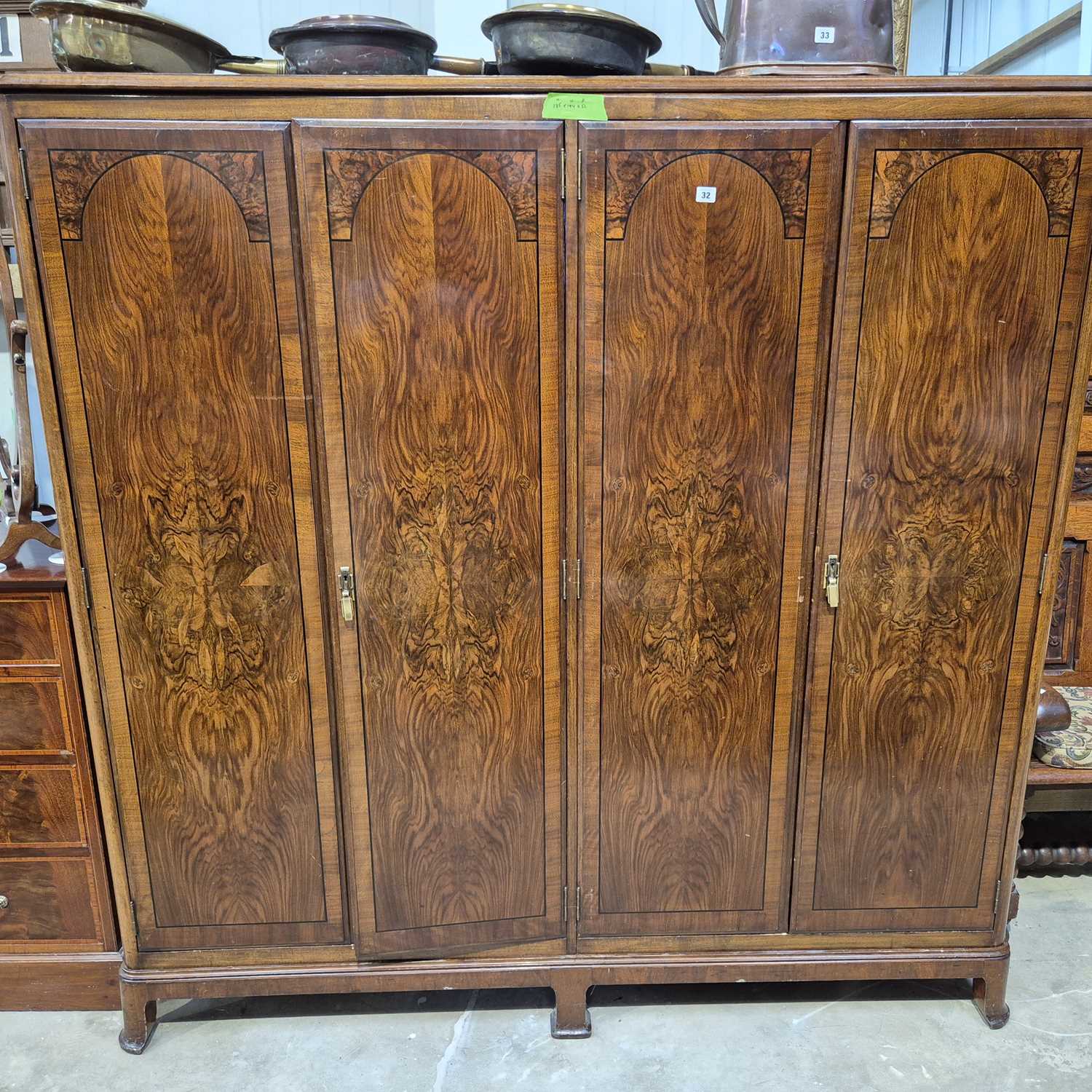 Lot 32 - An Art Deco walnut compactum wardrobe. 184 x...