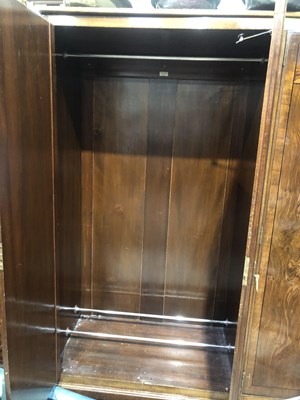 Lot 32 - An Art Deco walnut compactum wardrobe. 184 x...