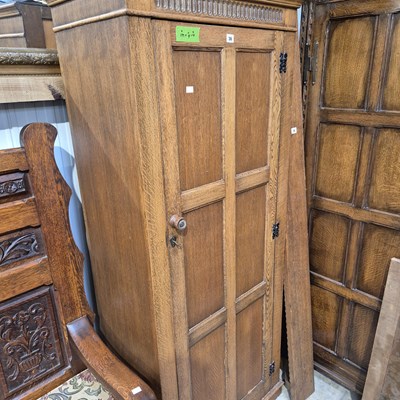Lot 36 - A small oak hall cupboard. 75 x 42 x h 179 cm.