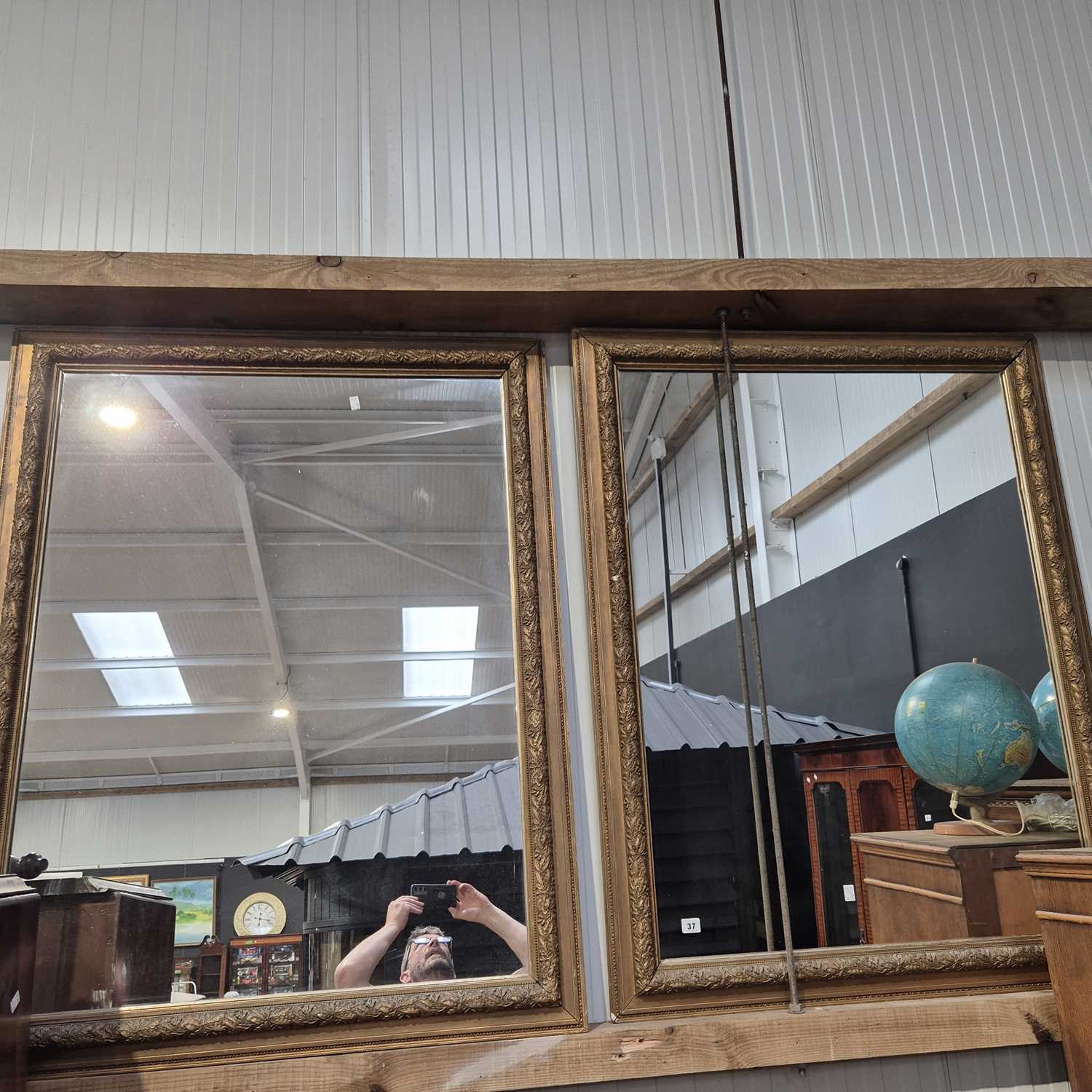 Lot 37 - A pair of large gilt-framed wall mirrors.