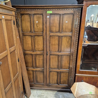 Lot 38 - An oak panel door wardrobe. 130 x 65 x h 187 cm.