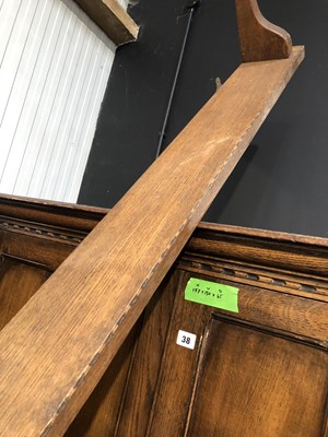 Lot 39 - A long oak wallshelf. 312cms long