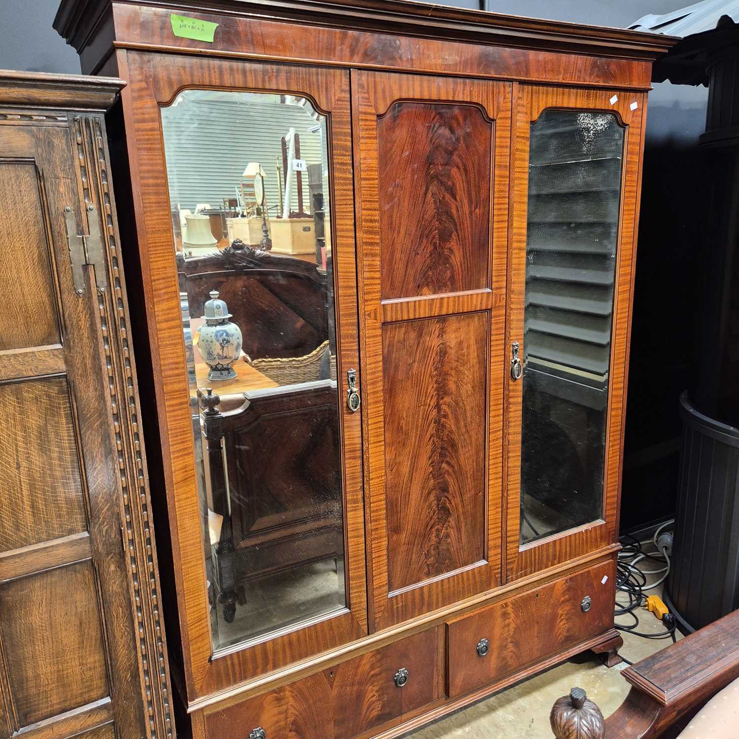 Lot 41 - An Edwardian mahogany triple wardrobe. 161 x...