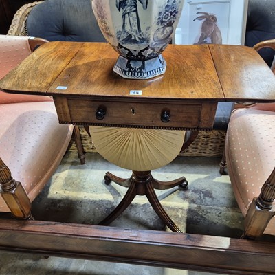 Lot 45 - A Regency mahogany work table.