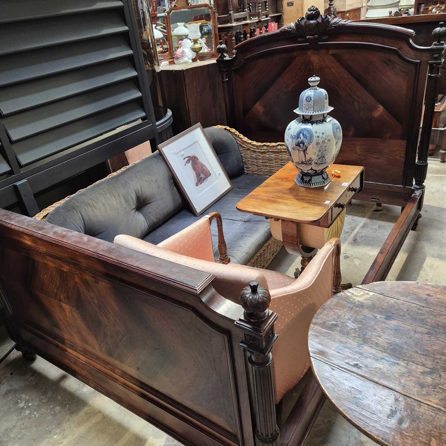 Lot 46 - A French rosewood double bed frame. H 145 W...