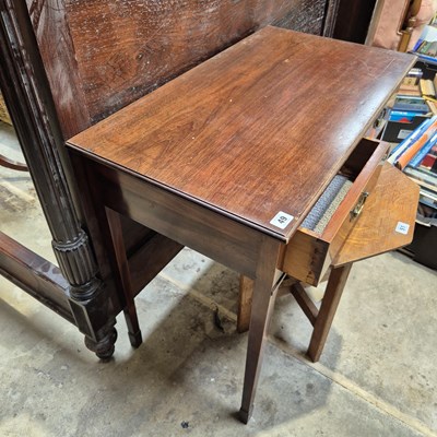 Lot 49 - A small mahogany side table with two drawers.