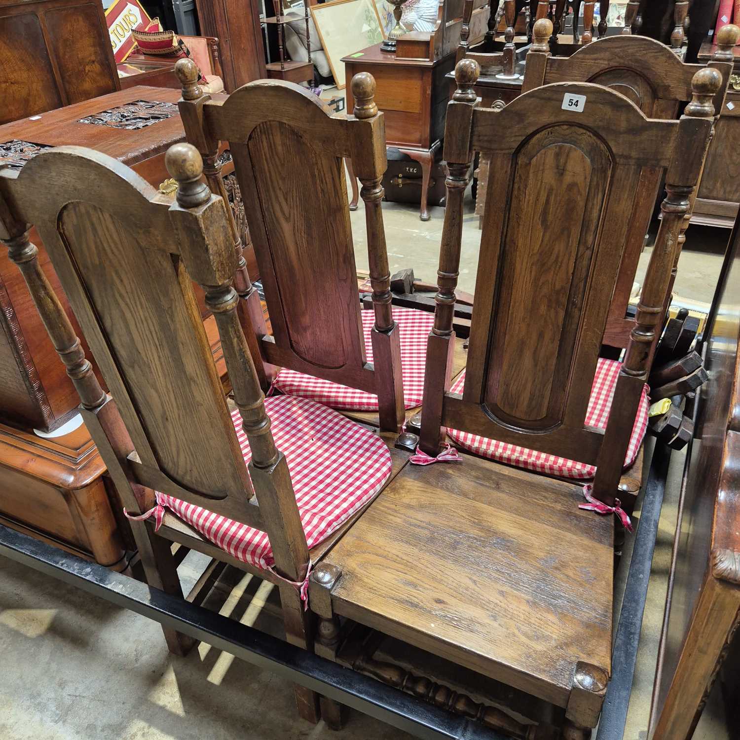 Lot 54 - Four panel-back side chairs.