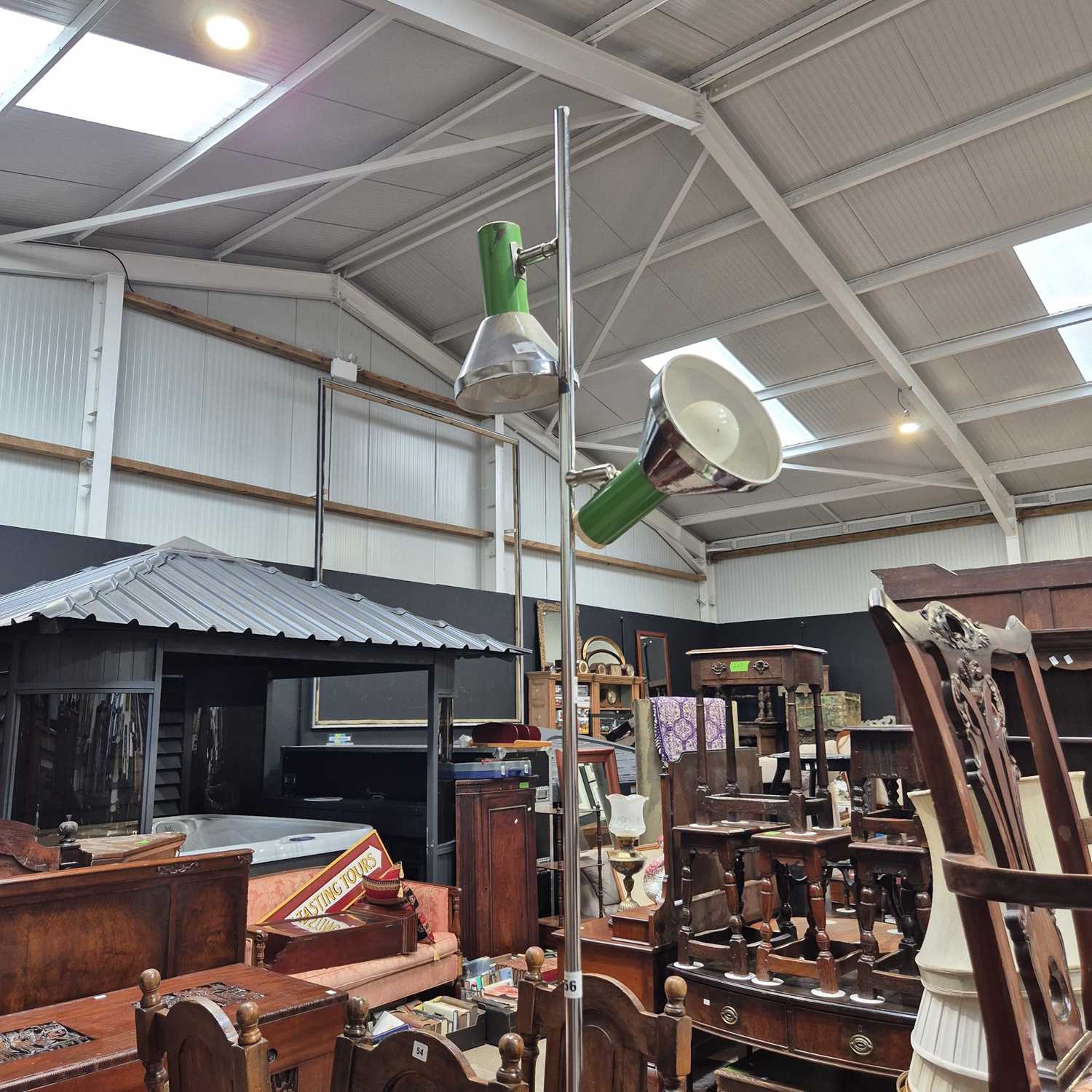 Lot 56 - A mid-century double spot light standard lamp.
