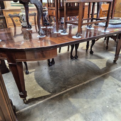 Lot 58 - An antique Georgian-style mahogany extending...