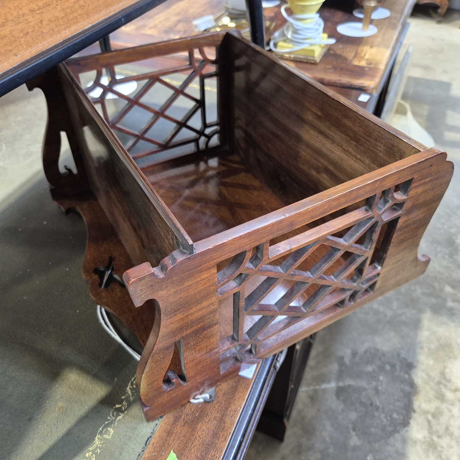 Lot 67 - A mahogany decorative wall shelf.