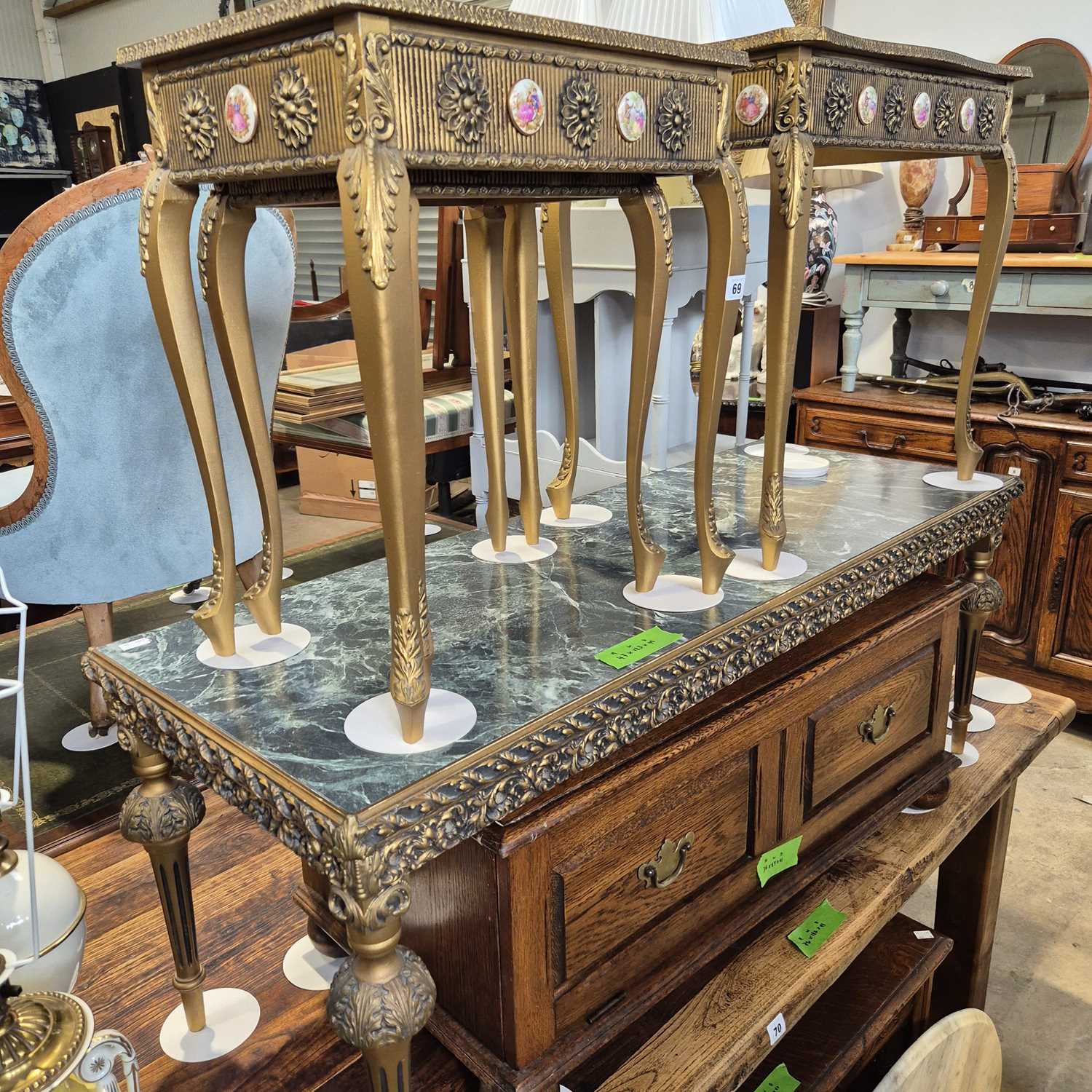 Lot 69 - A nest of gilt tables, a similar coffee table,...