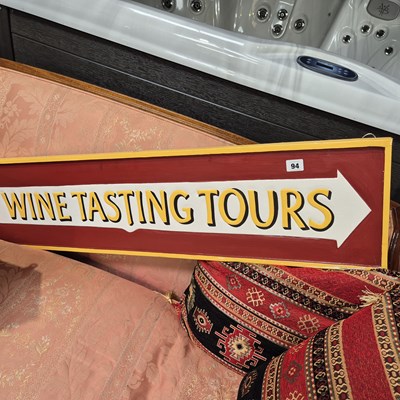 Lot 94 - Wine Tasting Tours advertising sign.