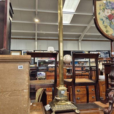 Lot 110 - A large brass standard lamp.