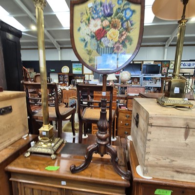 Lot 111 - A Victorian pole screen.