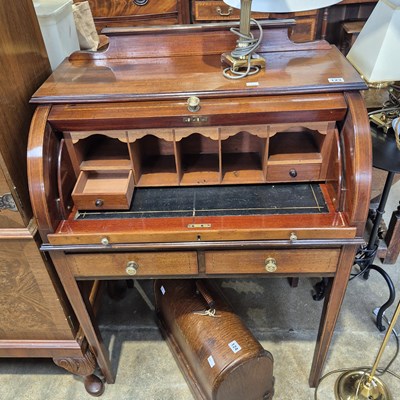 Lot 123 - An Edwardian mahogany cylinder top writing desk.