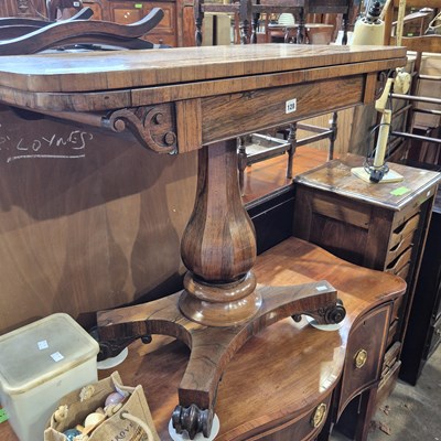 Lot 128 - A William IV rosewood foldover card table.