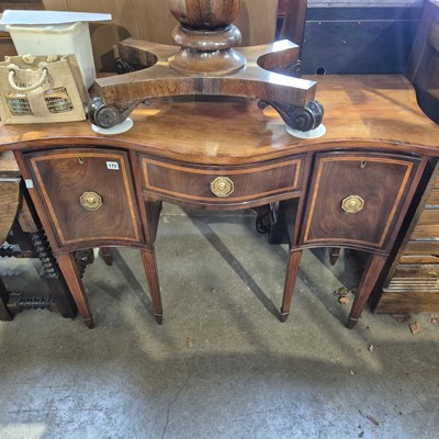 Lot 172 - A 19th-century mahogany small serpentine front...