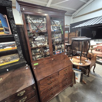 Lot 141 - A late Georgian mahogany bureau-bookcase. 106...