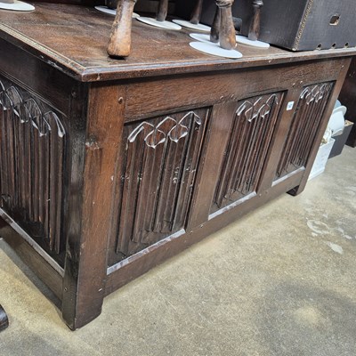 Lot 147 - An oak small coffer with carved linen-fold panels