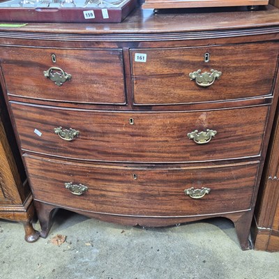 Lot 161 - A Georgian mahogany bow-front chest of four...