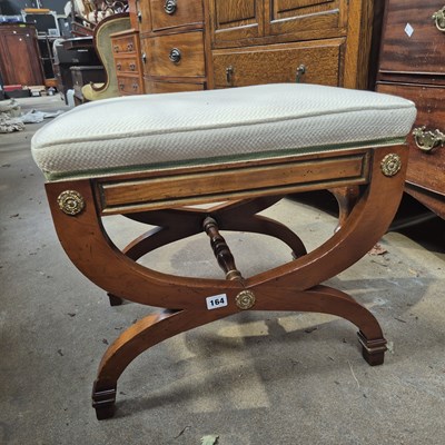 Lot 164 - A Regency style X-frame stool.