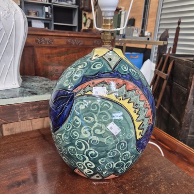 Lot 170 - An art pottery table lamp.
