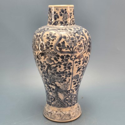 Lot 860 - A Chinese blue and white baluster vase painted...