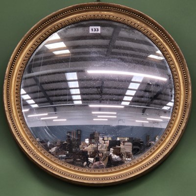 Lot 133 - An English antique Regency style gilt convex...