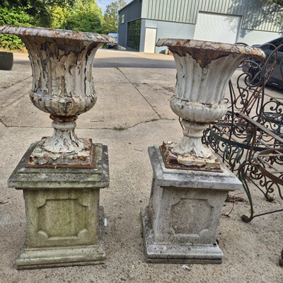 Lot 137 - A Pair of antique cast iron Campana form...