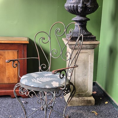 Lot 260 - A 20th-century wrought iron set of four garden...