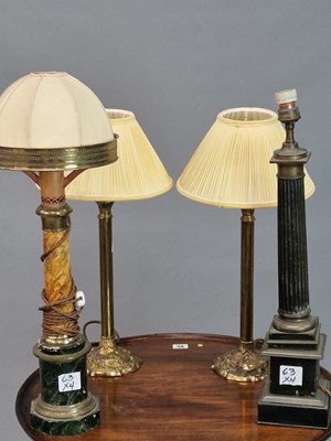 Lot 63 - A small pair of antique brass column lamps,...