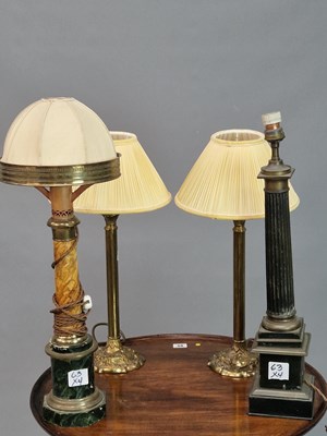 Lot 63 - A small pair of antique brass column lamps,...