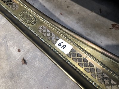 Lot 6 - Brass fire fender. H 13 W 92 D 31cms