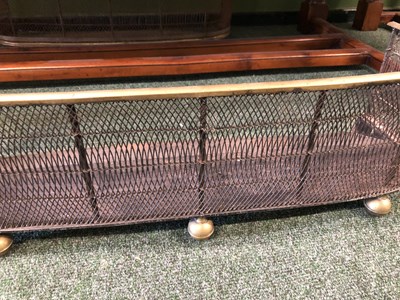 Lot 53 - An early 19th Century wirework and brass fire...