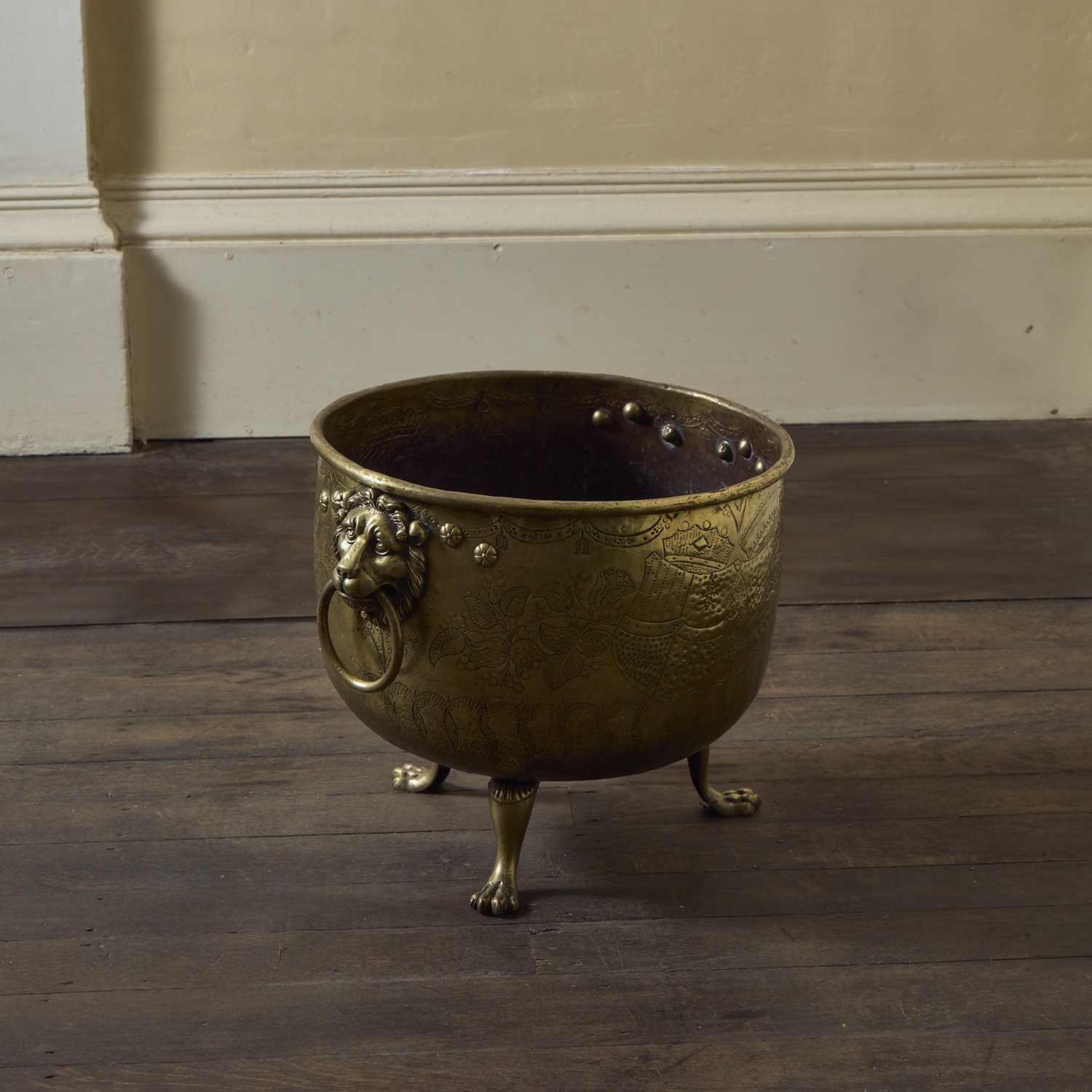 Lot 53 - An antique Georgian style brass log bin,...