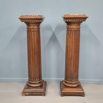 Lot 220 - A pair of antique carved walnut classical form...