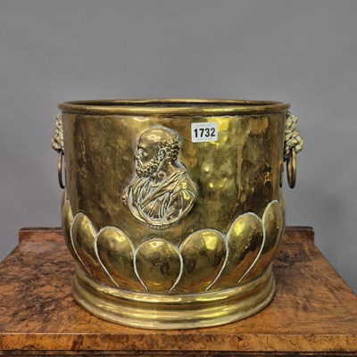 Lot 1732 - A brass coal bucket applied on one side with a...