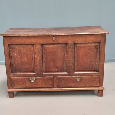 Lot 1737 - An 18th century oak mule chest the three...