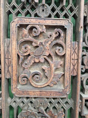 Lot 25 - A pair of carved Oriental panels, together...