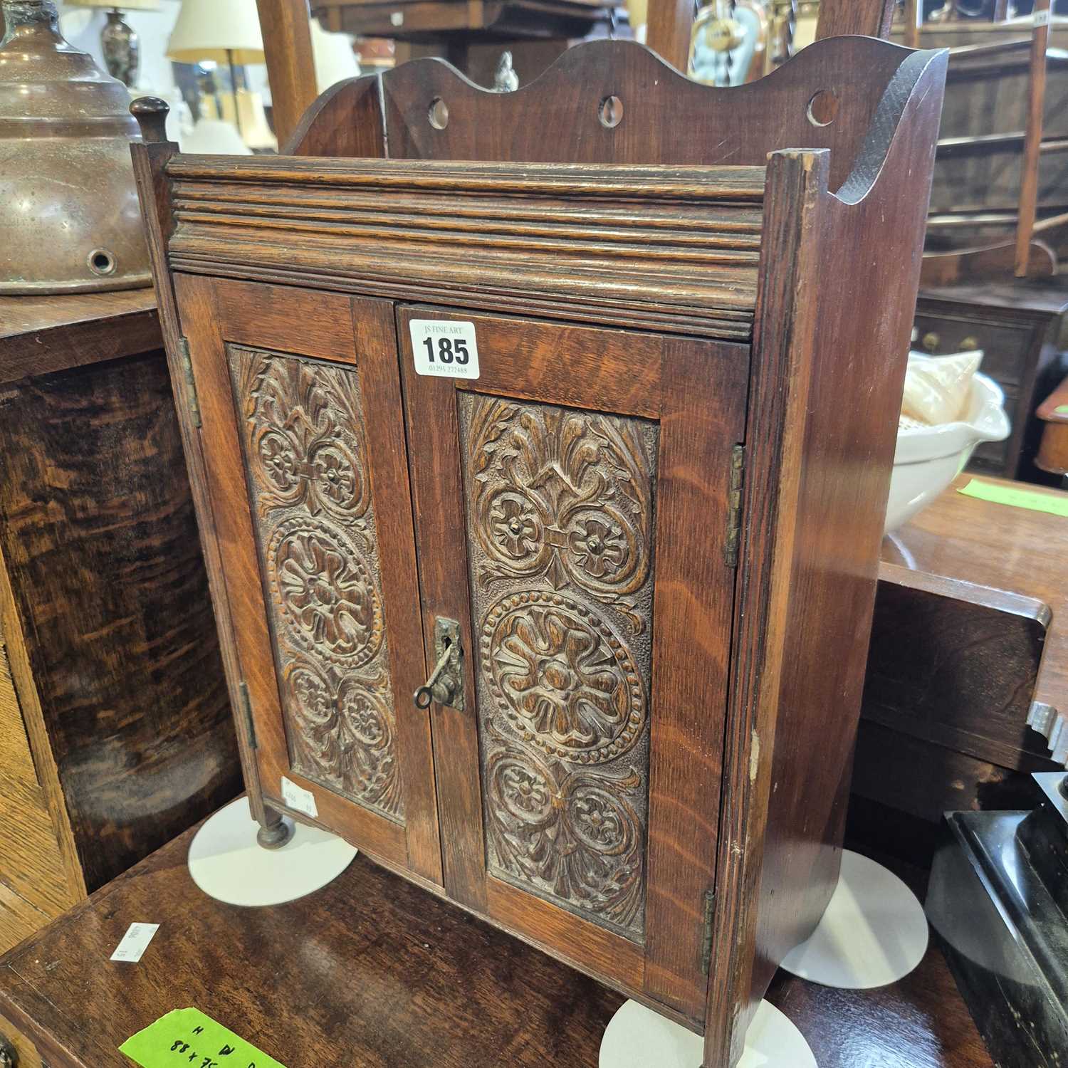Lot 185 - An oak smokers cabinet