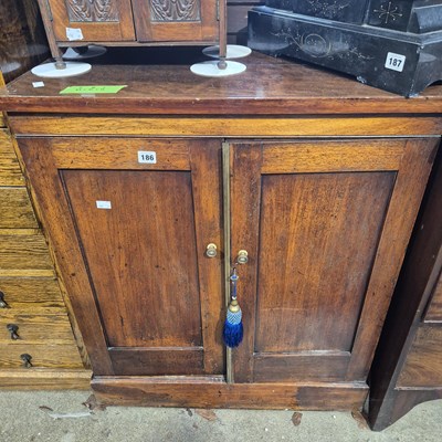 Lot 186 - An early Victorian mahogany side cabinet