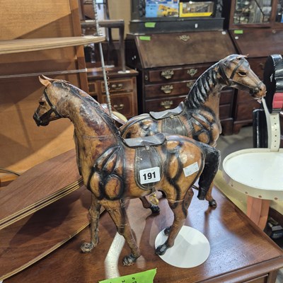 Lot 191 - Two moulded leather horse figures